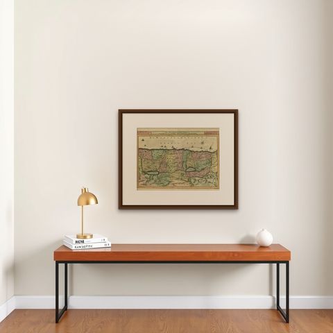 Antique Map of the Holy Land by Schut, 1710, shown framed on a wall, true to size